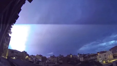 Long lighting bolt moving through the clouds on a strong storm night Video stock 119494285