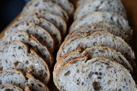 Long line of bread slices close-up view Stock Photos