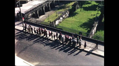 Long Line at Bus Stop Edinburgh 1957 - 3 Stock Footage 48234557
