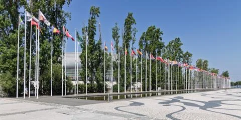 A long line of flags from various nations flies at the site of Expo '98 in Li Stock Photos