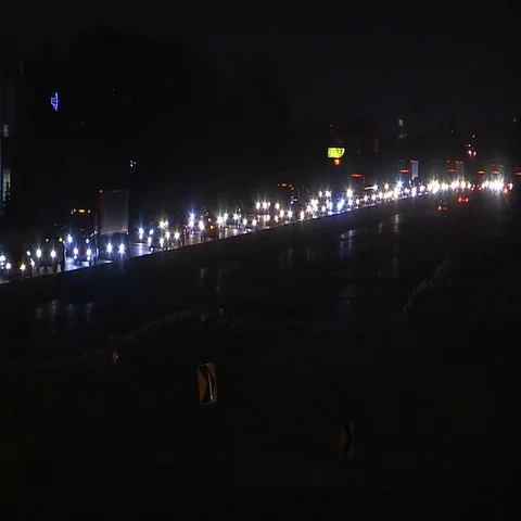 Long line of heavy traffic on the highway at night in rush hour Stock Footage 69537399