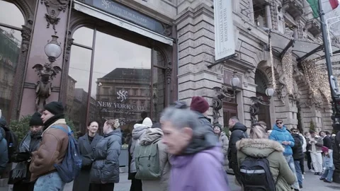 Long line of hungry people queue outside New York Cafe in Budapest Stock Footage 297675660