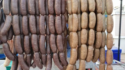 Long line pattern of Thai sausage styles at the street market Thailand Stock Footage 101448613