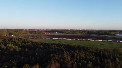 A long line of trucks at the EU border. Top view of the queue at the entrance to Stock Footage 253995815