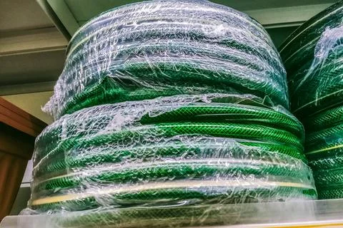 A long loop of water pipe rubber hose Stock Photos