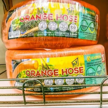 A long loop of water pipe rubber hose Stock Photos