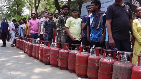 Long LPG queues persist across India as Middle East conflict deepens supply cris Stock Footage 331509611