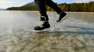 Long Male Legs In Black Leggins With Hockey Skates. Outdoor Ice Skating On The L Stock Footage