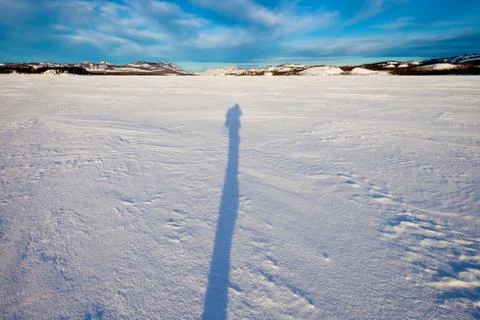 Long mid-winter shadow Stock Photos