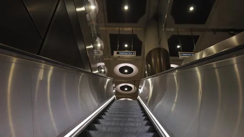 A long, narrow, silver staircase with a shiny, reflective surface Stock Footage 297859832