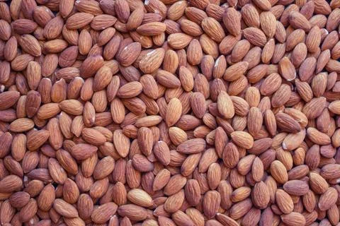 Long nuts of almonds. Stock Photos
