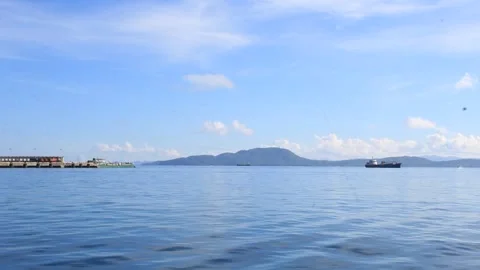 Long ocean trip on Pacific Waves Splashing on a Boat travel in the ocean with su Stock Footage 160434478