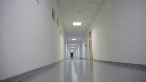 Long office hallway Stock Footage 72429921