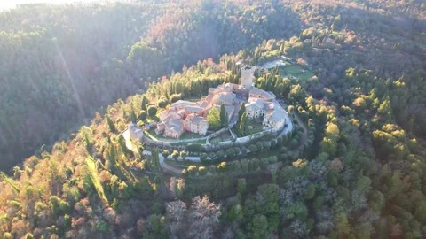 Long Orbit aerial drone view Gargonza Castle Tuscany Italy Stock-Footage 168539975