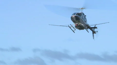 Long orchard row spray run of a helicopter Stock Footage 838574