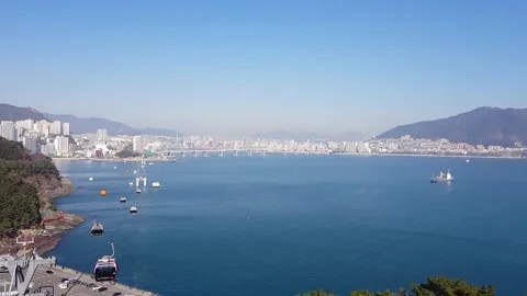 Long Pan of Songdo Cable Car and Coastline with Mountains in Busan South Korea 스톡 동영상 154047230