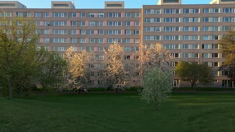 Long panel residential apartment blocks and green park in Prague 11. Aerial.. Stock Footage 345168781