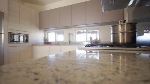 Long panning right to left of modern kitchen Stock Footage 115212801