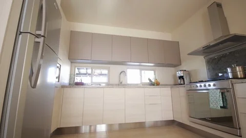 Long panning right to left of modern kitchen Stock Footage 115212823