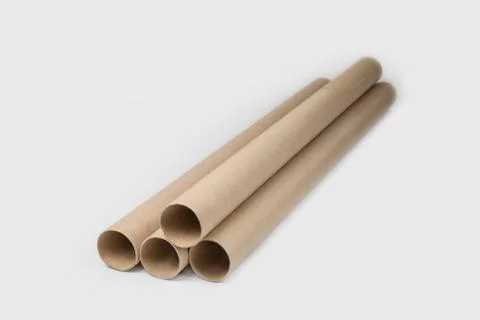 Long paper rolls on a white background. Conceptual and environmental. Stock Photos