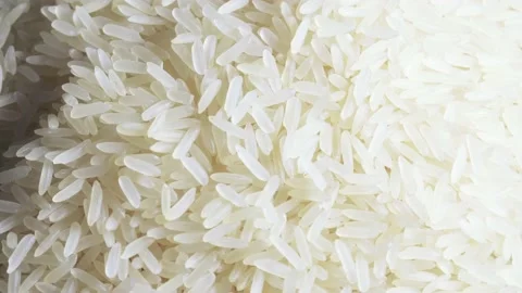 Long parboiled rice on table Stock Footage 159506615