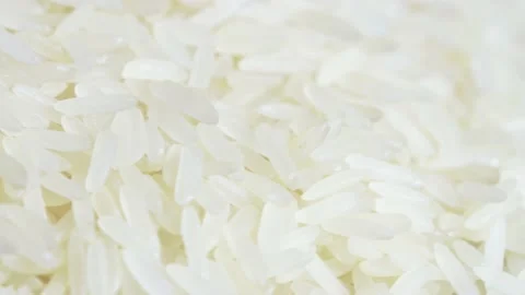Long parboiled rice on table Stock Footage 234266887
