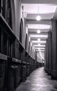 Long passage with elegant columns and lights Stock Photos