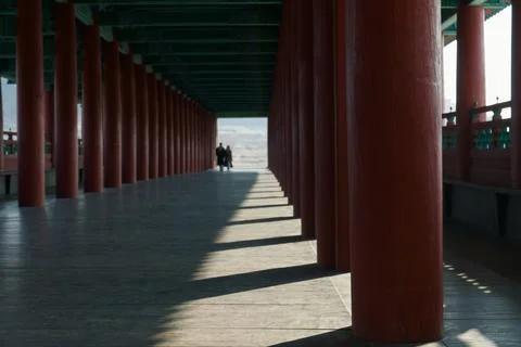 Long Pavilion Walkway With Dramatic Light and Shadows Stock Photos