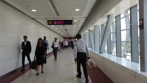 Long pedestrian bridge over Sheikh Zayed Road in Dubai connecting the metro s Video stock 312333660