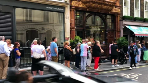 The long people queue for the Freddie Me... | Stock Video | Pond5