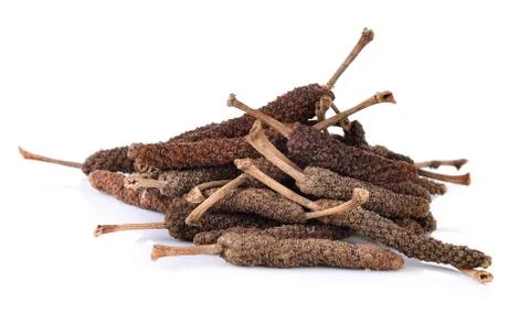 Long pepper on white background Stock Photos