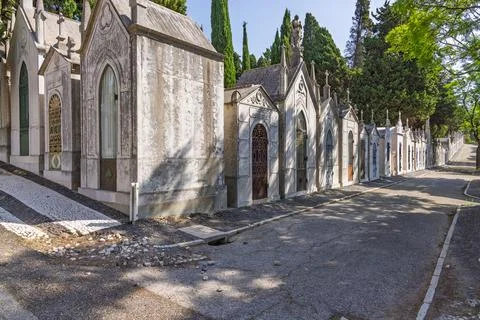 A long perspective view down an avenue of elaborate 19th-century mausoleums a Stock Photos