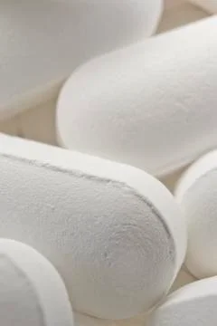Long pills macro Stock Photos