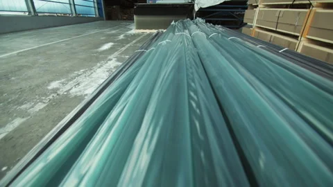 Long plastic connecting profiles packed in warehouse Stock Footage 230037319