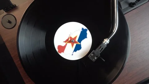 Long Play Vinyl Record With Flag and Map of Former Yugoslavia, Ex-Yu Music 库存影片 333049615