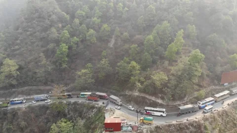 Long Queue of Buses on Mountain Road in Nepal Video stock 335989240