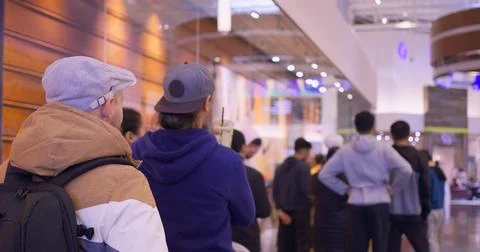 Long queue to checkout counter for clothing shopping. Cinematic video crowded Stock Photos