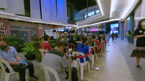 Long Queue for Coronavirus Vaccination Stock Footage 157809223