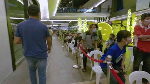 Long Queue for Coronavirus Vaccination Video stock 157809517