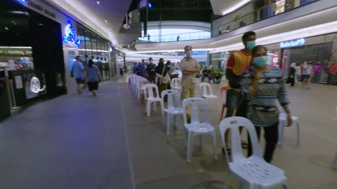 Long Queue for Coronavirus Vaccination Stock Footage 157809880