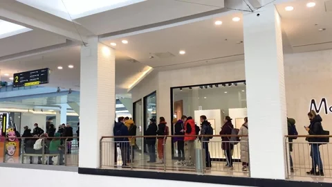 Long queue in front of Tinkoff Bank ATM to withdraw cash Stock Footage 171930881