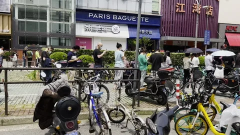 Long queue to get mandatory coronavirus PCR test Stock Footage 243418379