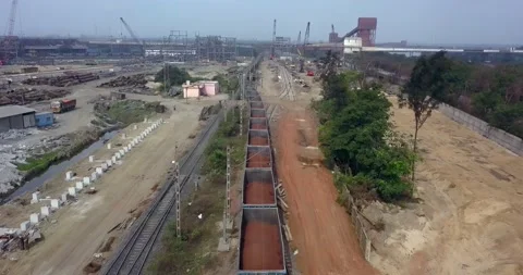 Long Queue Of Hopper Cars Loaded With Coal On Railroad Of Paradeep Port In Stock Footage 202078690