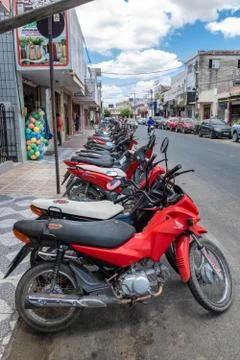 Long queue of motorcycles parked in the deep interior of Brazil Stock Photos