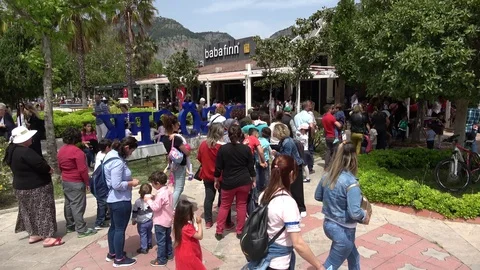 Long queue near bakery at the children holiday Stock Footage 107126498