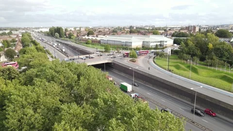 Long queue of slowly moving vehicles on trunk road Stock Footage 164728718