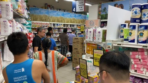 Long Queue at Supermarket Aisle during Food Run Stock Footage 126427090