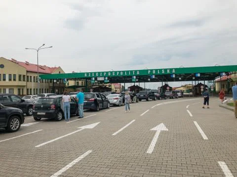 Long queue willing to cross the border between Russia and Poland Stock Photos