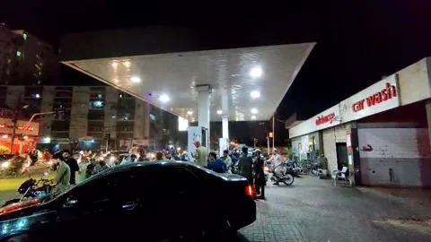 Long queues at Pakistani gas stations amid fears of fuel price increases, KARACH Stock Footage 330268267