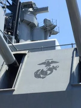 Long range navy guns and turret with US Marine Corps logo Stock Photos
